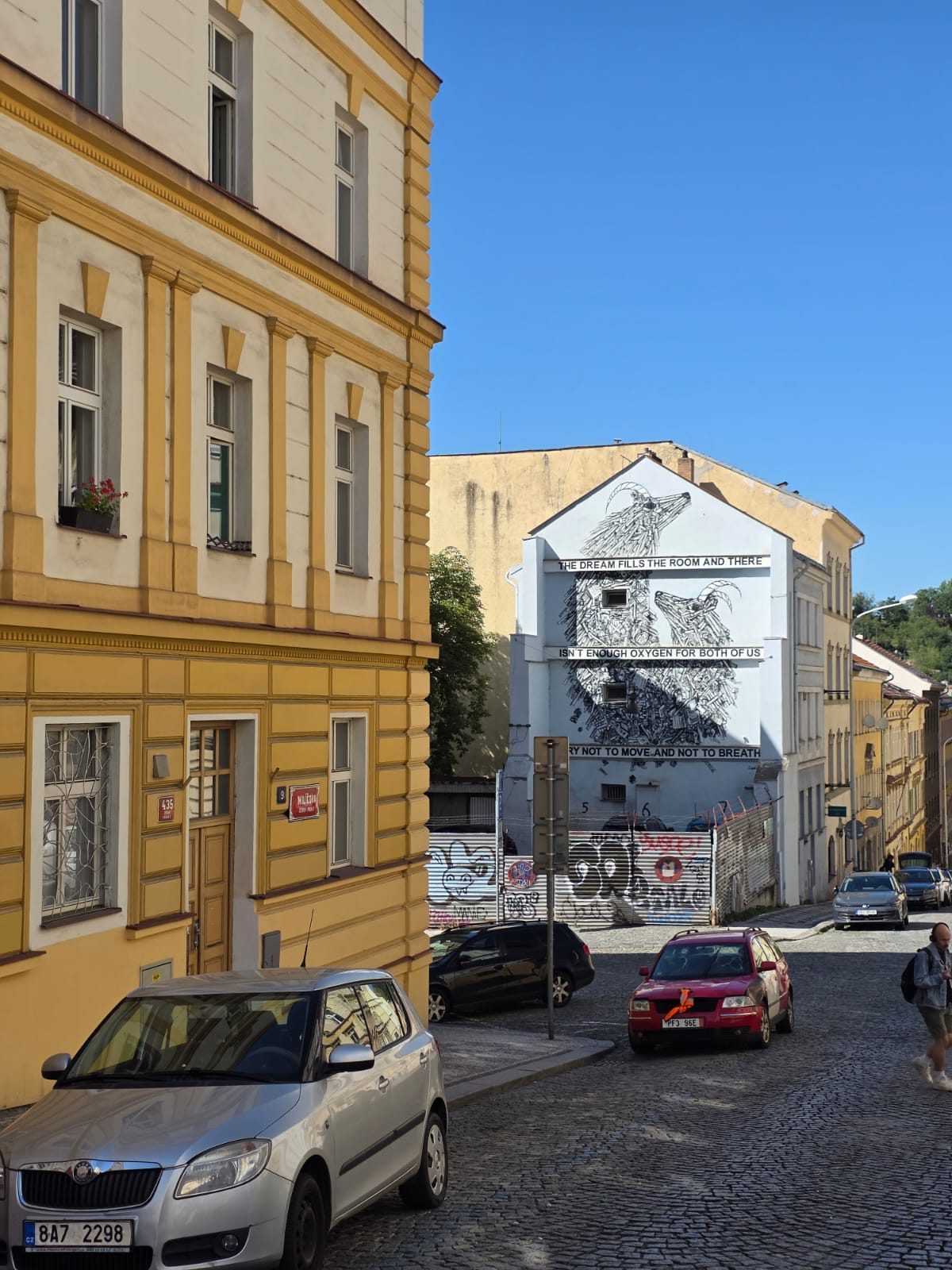The same corner today — the plot now serves as the hotel parking lot